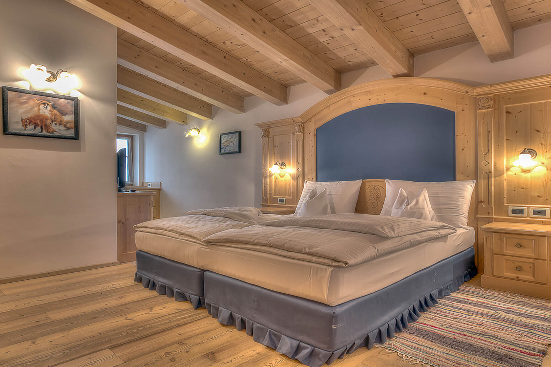 Doppelbett in der Ferienwohnung Rütort - Posta Zirm